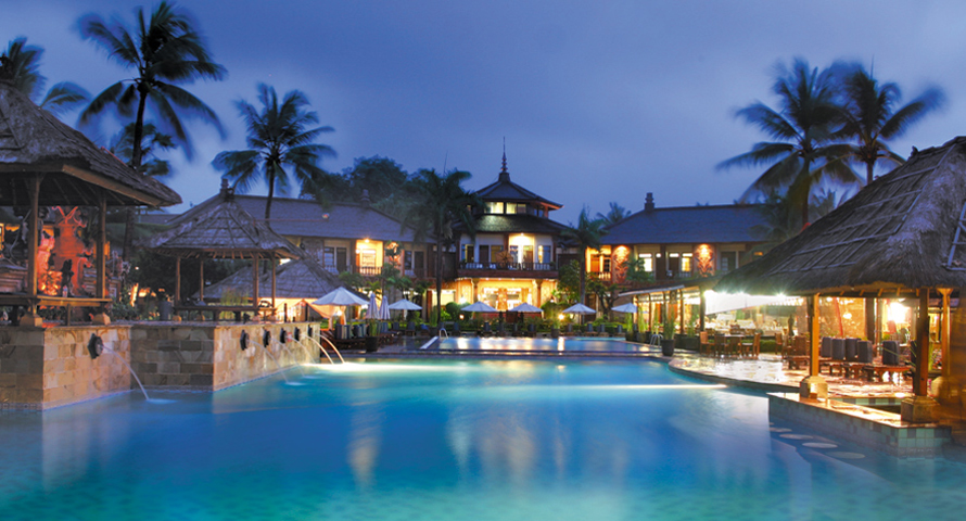 Resort Pool and Restaurant Area Evening View at Jayakarta Resort Legian Bali